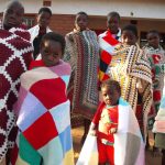Chinthowa children receiving blankets